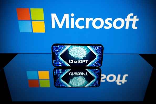 This picture taken on January 23, 2023 in Toulouse, southwestern France, shows screens displaying the logos of Microsoft and ChatGPT, a conversational artificial intelligence application software developed by OpenAI. - Microsoft extended on January 23 its partnership with with OpenAI, the research lab and creator of ChatGPT, a conversational artificial intelligence application software, in a "multiyear, multibillion dollar investment". (Photo by Lionel BONAVENTURE / AFP) (Photo by LIONEL BONAVENTURE/AFP via Getty Images)