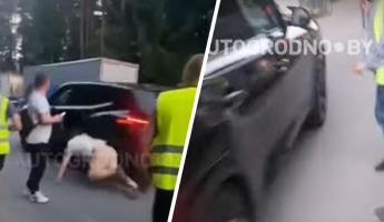 «Э, ты что делаешь?!» — Появилось видео, как BMW прорывался из Литвы в Беларусь через «народных дружинников»