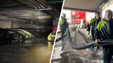 «Утонуло» 14 авто. В МЧС показали, как спасатели откачивают воду из подземного паркинга в Минске