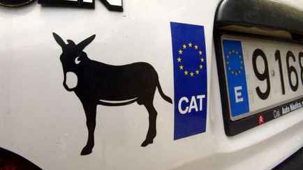 Что означает наклейка в виде осла на машине? Вот причём тут экология