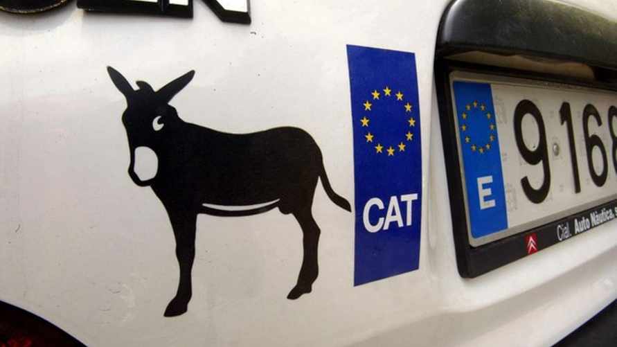 Что означает наклейка в виде осла на машине? Вот причём тут экология