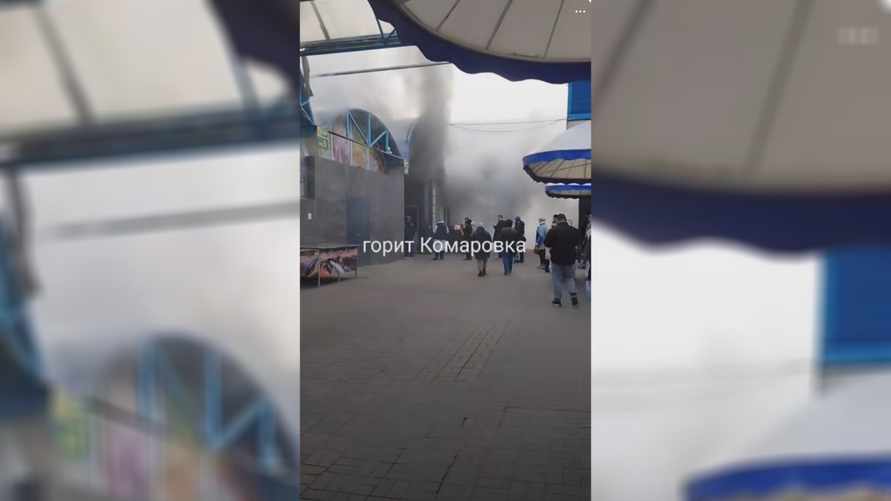 Столб дыма над рынком. Минчане показали, как горела Комаровка