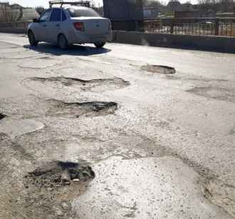 Как белорусам быстро пожаловаться на ямы на дороге? ГАИ предложила сделать фото и еще два шага